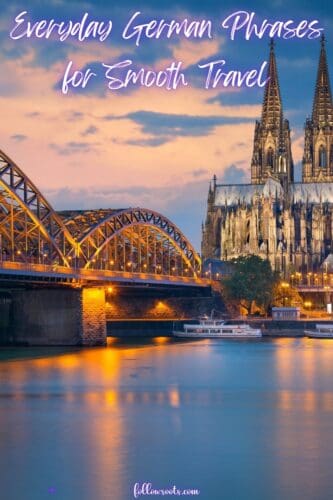 This image features the Cologne Cathedral over looking the rive and a spectacular Bridge. It is a Pinterest Pin titled, Everyday German Phrases for Smooth Travel.