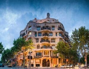 This image is of Casa Mila, a whimsical apartment building designed by Antoni Gaudi 