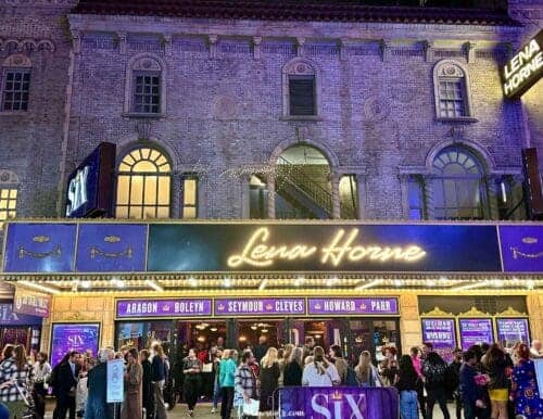 Image of Lena Horne Theatre in the theatre district after dark. Photo by Lisa Soots