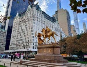 This is an image of the Plaza Hotel with a gold horse statue in front. Photo by Lisa Soots