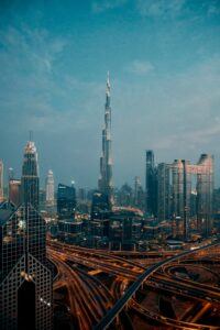 This image features a view of the epic city of Dubai with its tallest building in the center