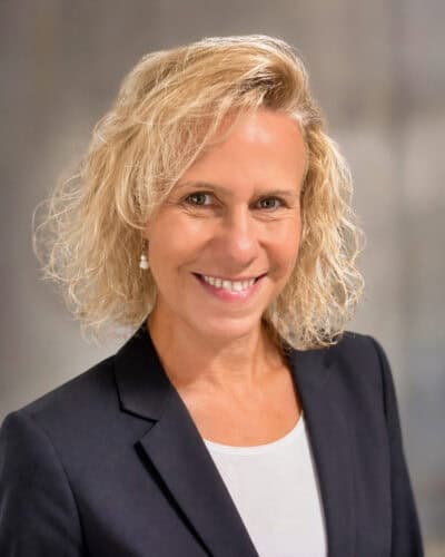 This image features a professional head shot of Lisa Soots, the creator behind FollowSoots.com