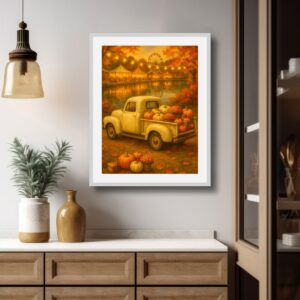 Cream vintage pickup truck filled with pumpkins and autumn flowers beside a glowing fall festival, with string lights, colorful foliage, tents, and a Ferris wheel reflected in the water. This image is featured  on a gray wall over a credenza. 