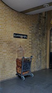 Luggage cart at Platform 9 3/4 evokes a magical journey in King's Cross.