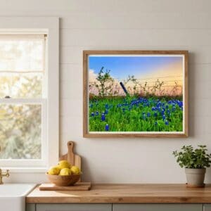 This image features a framed Texas Bluebonnet sunset framed art print in a kitchen. 